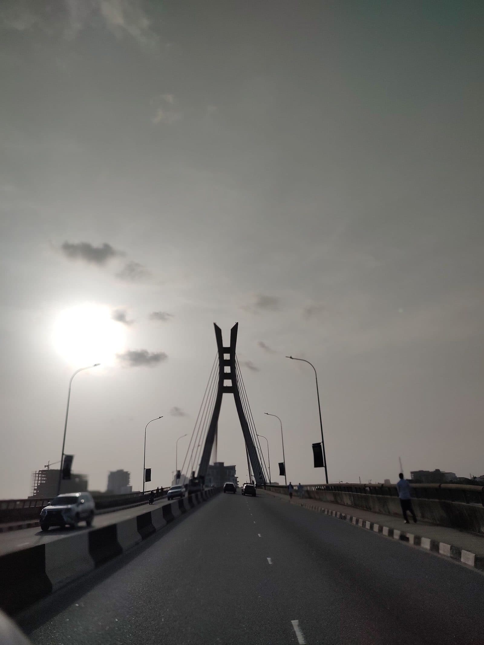 Walking toward the Lekki-Ikoyi Link Bridge